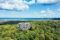 Vom Aussichtsturm des Baumwipfelpfads kann man bis hinüber zu Ostsee schauen © TMV/Gänsicke