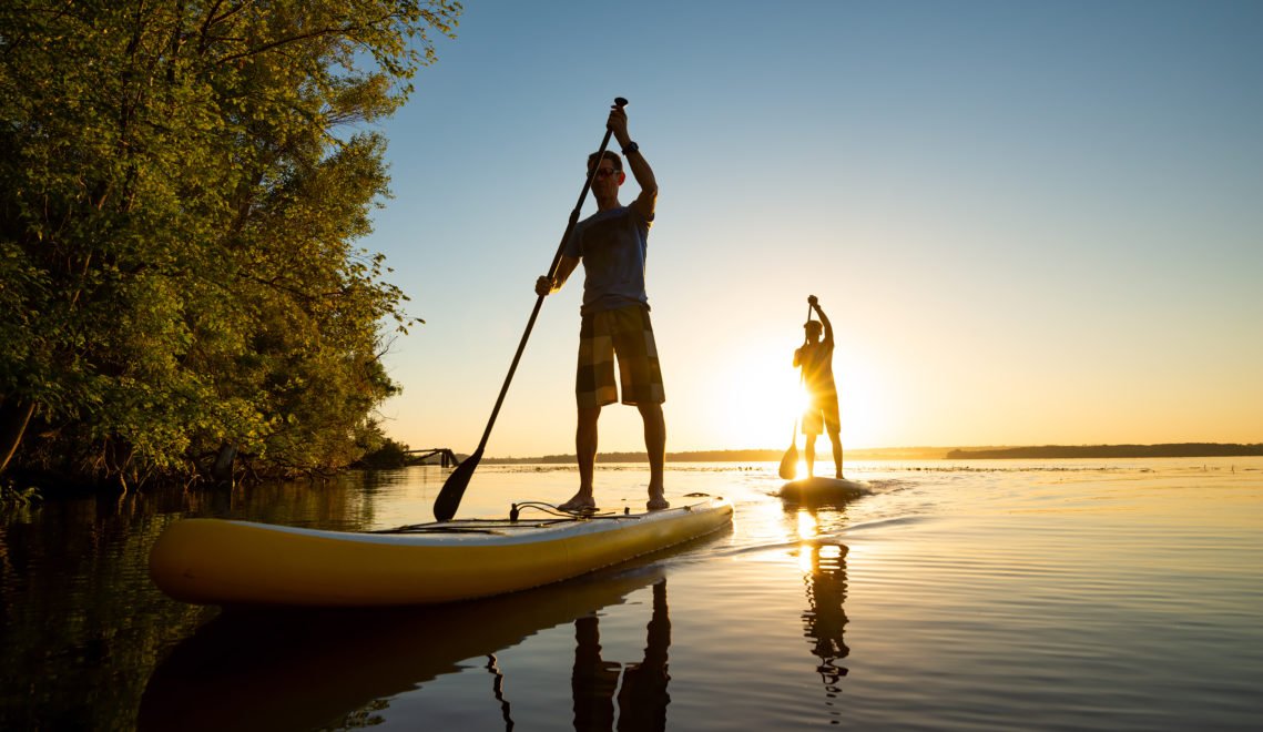 A question of balance - Stand Up Paddling can be done at any age © Sanchik - shutterstock