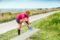 Lace up your shoes: Anne Schönrock prepares for a run on the Ahrenshoop cliff ©TMV/Tiemann
