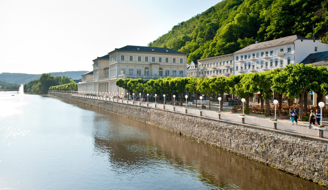 The water of the Lahn reflects the historic Kursaal building of Bad Ems - the architectural gem of the town