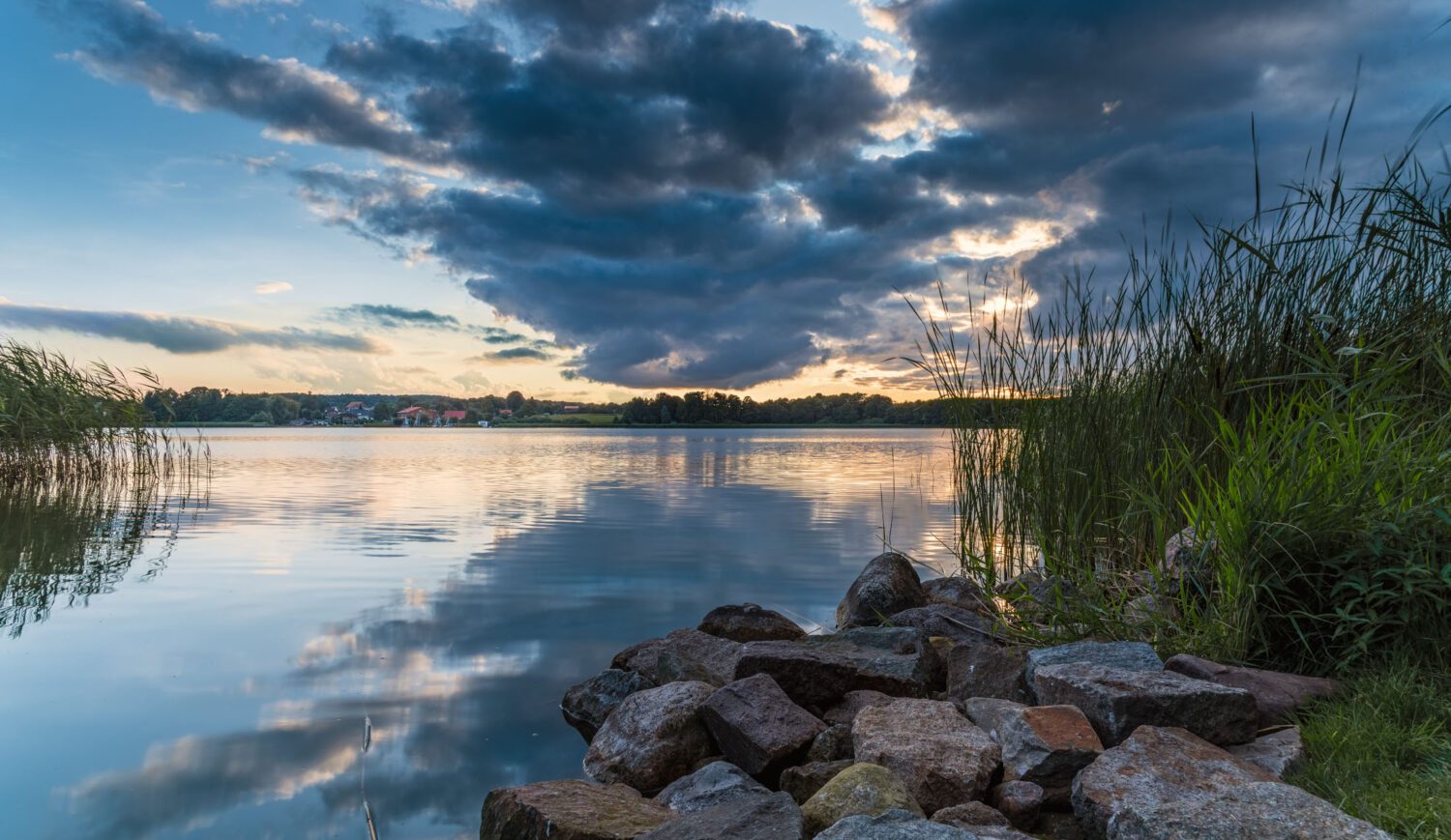 Lake Hemmelsdorf is geographically the lowest point in Germany and worth a trip for cyclists, hikers and nature lovers © Christian - stock.adobe.com